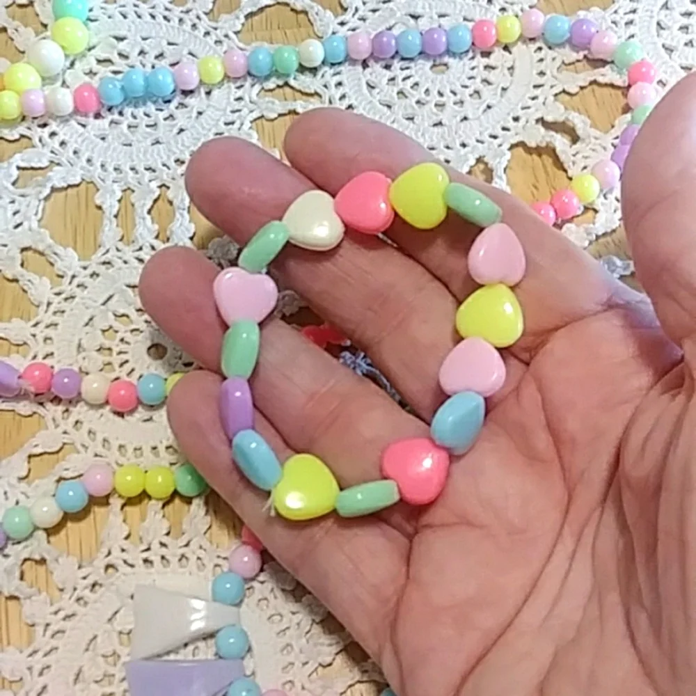 New girl's pastel costume jewelry sets - hearts and dino teeth